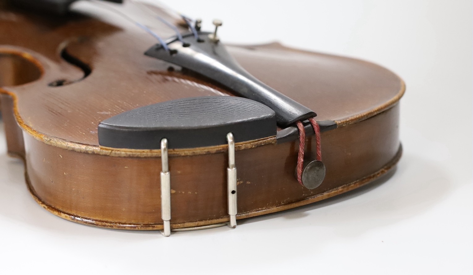 A Maidstone violin, with bow, cased. violin 59 cms high.